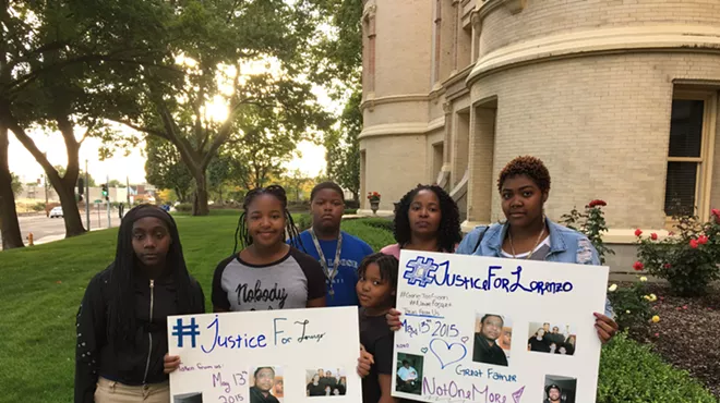 Image: After eight deaths in 14 months inside the Spokane County Jail, families rally outside the courthouse