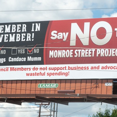 Councilmembers Beggs and Mumm never voted on Monroe  lane reduction — but billboard targets them anyway