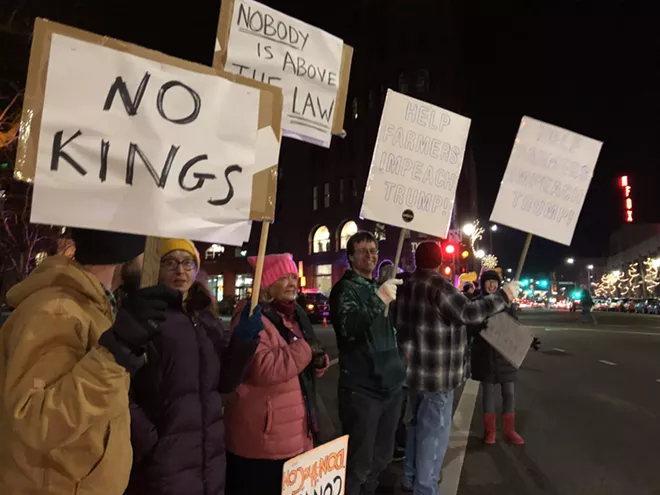 Image: Impeachment supporters gather in downtown Spokane on Tuesday night