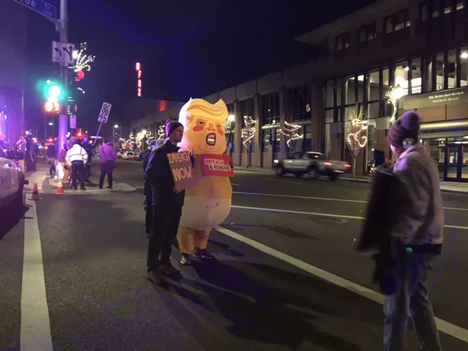 Image: Impeachment supporters gather in downtown Spokane on Tuesday night