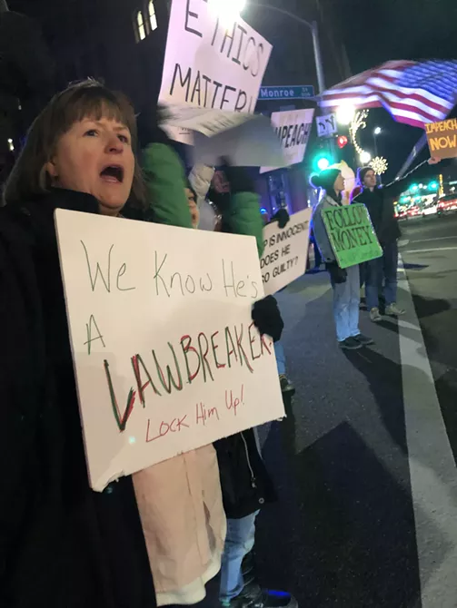 Image: Impeachment supporters gather in downtown Spokane on Tuesday night