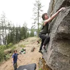 Image: An indoor rock climber tackles Tubbs Hill bouldering in Coeur d’Alene, led by local guidebook author Owen Harro
