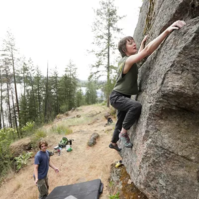 Image: An indoor rock climber tackles Tubbs Hill bouldering in Coeur d’Alene, led by local guidebook author Owen Harro