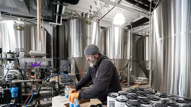 Image: Bottles, be gone. As Spokane breweries invest in canning equipment, canned beer is here to stay