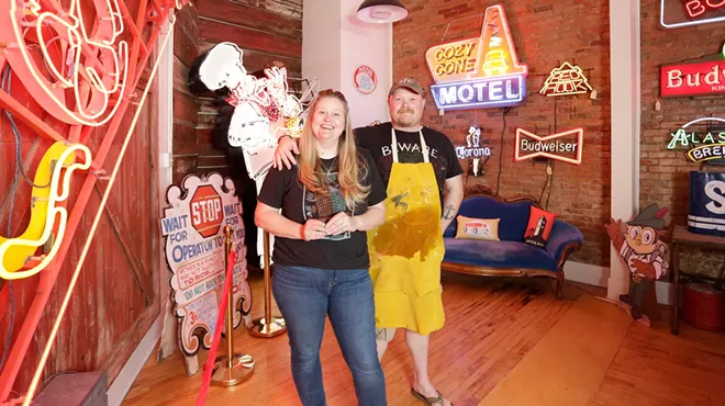 Image: Chris Bovey's relocated store is giving more space to his prints and collection of neon signage