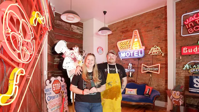 Image: Chris Bovey's relocated store is giving more space to his prints and collection of neon signage
