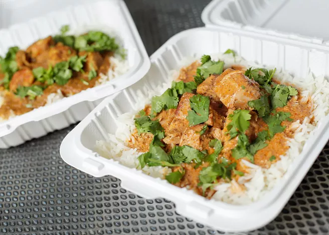 Butter chicken, right, and fish and shrimp curry.
