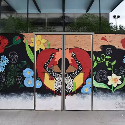 Image: In the wake of Spokane's Black Lives Matter protests, artists give boarded-up businesses positive paint jobs