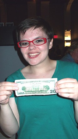 Molly Fitzpatrick takes home the prize in last night's Poetry Slam semifinals.