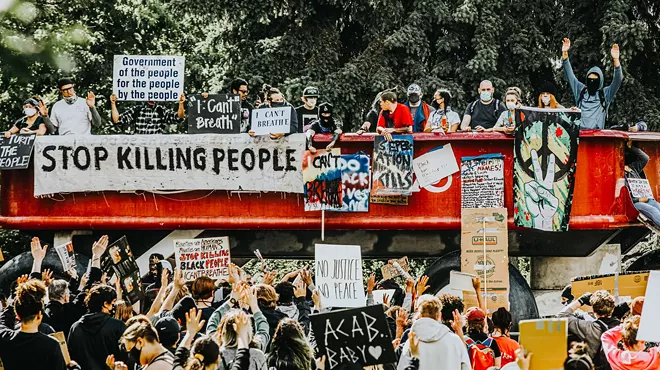 Image: Night and day: A George Floyd protest in downtown Spokane becomes something else