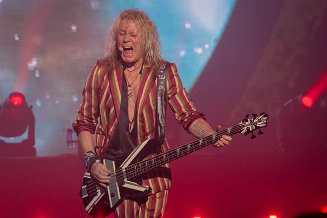 Photos of Def Leppard performing at the Spokane Arena on September 6, 2024