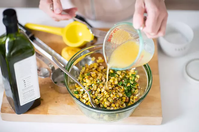 Image: Pistachio Halibut with Smoked Tomatoes and Corn Salad