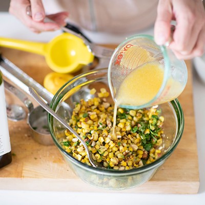 Image: Pistachio Halibut with Smoked Tomatoes and Corn Salad