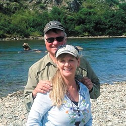 A North Idaho woman's husband is dead, and she is on the lam, wanted for alleged embezzlement