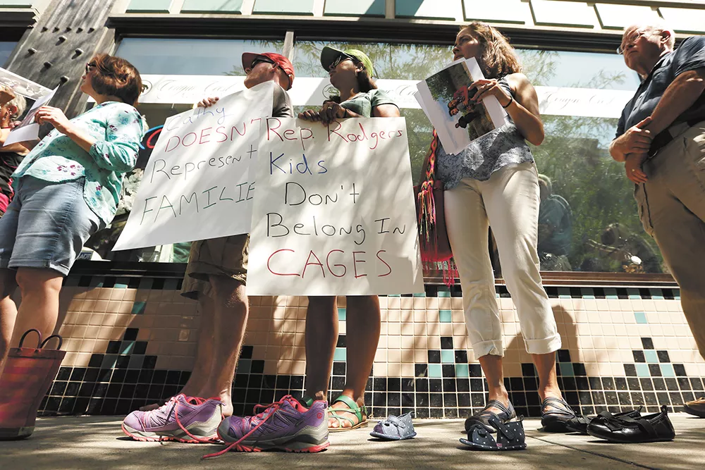 Activists aren't just waving signs; they're banding together to help immigrants at the ground level