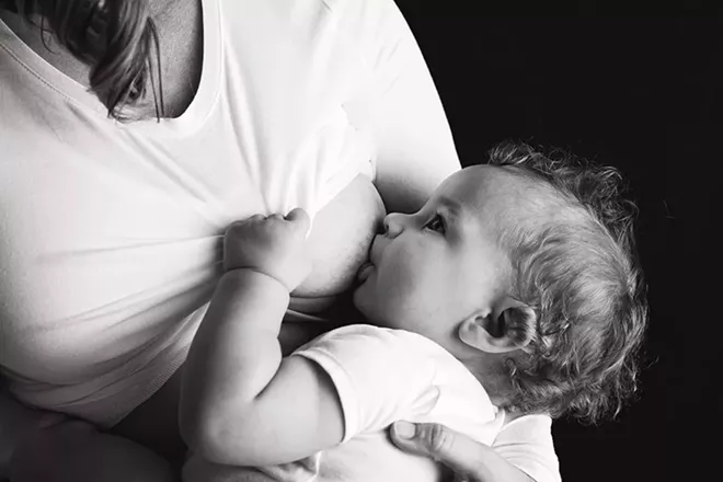 The Big Latch On encourages local moms to breastfeed in public