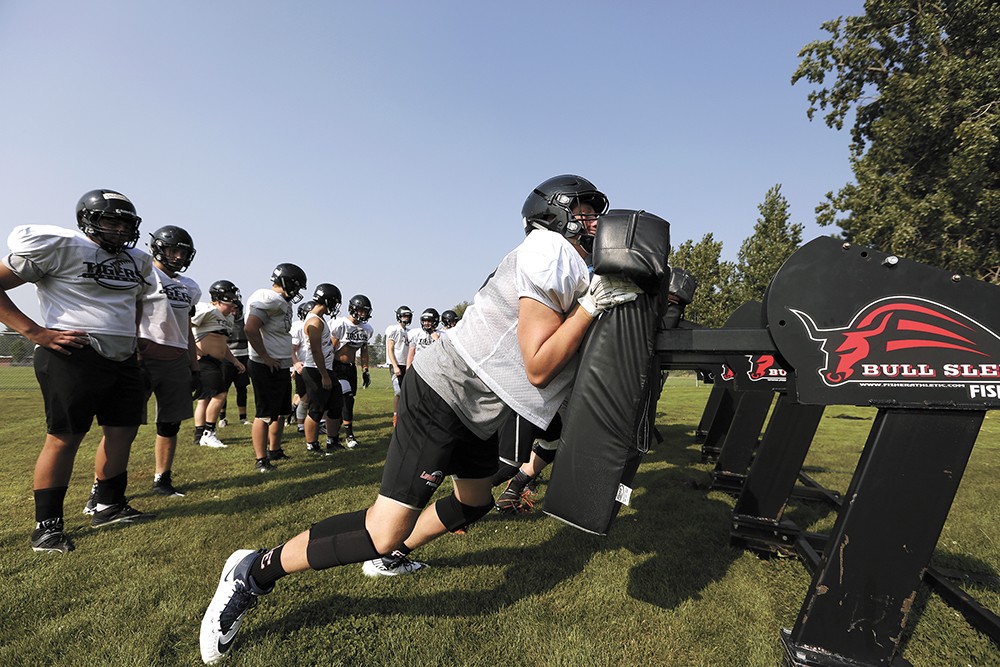 In Spokane, parents weigh the dangers of youth football against the love of the game
