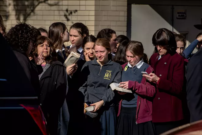 Back-to-back funerals. Mourners 50 deep. Pittsburgh grieves, 11 times over.