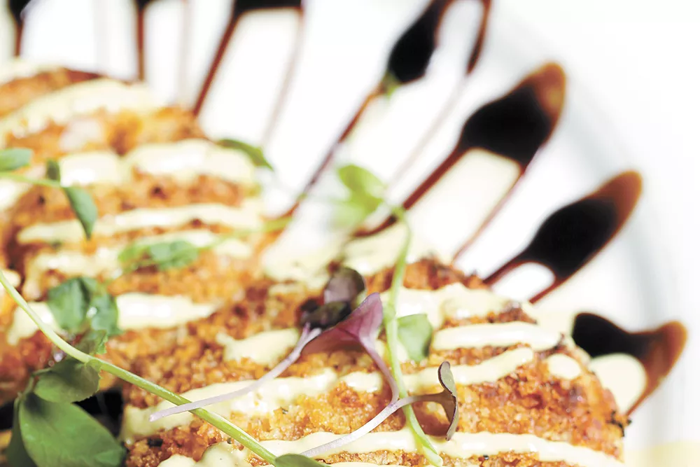 The Palm Court Grill at the Historic Davenport puts its owner's love of Dungeness crab on delicious display