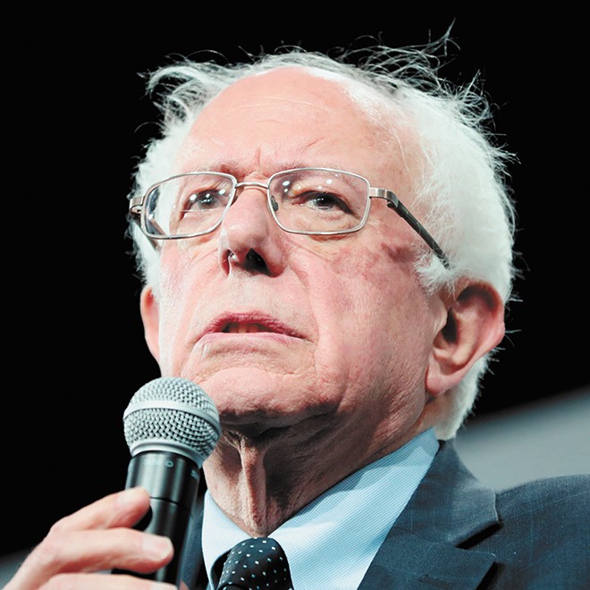 Sanders will remain in race and attend Sunday’s debate