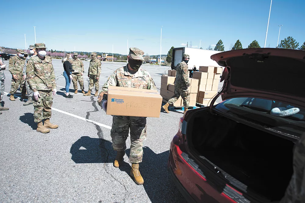 Food banks prepare to feed far more as COVID-19 disrupts America's food system at every level