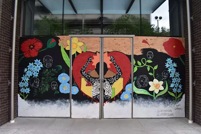In the wake of Spokane's Black Lives Matter protests, artists give boarded-up businesses positive paint jobs