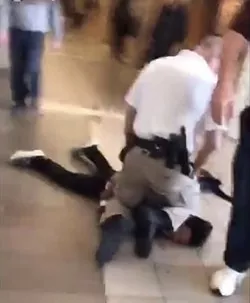 Parents call for the resignation of a Spokane school board member who previously defended a school cop who pinned a student's neck (2)