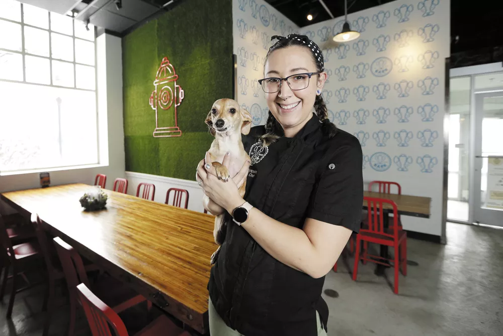 Chef Kayleigh Wytcherley created the menu at Bark, A Rescue Pub, where takeout may also include a new furry companion