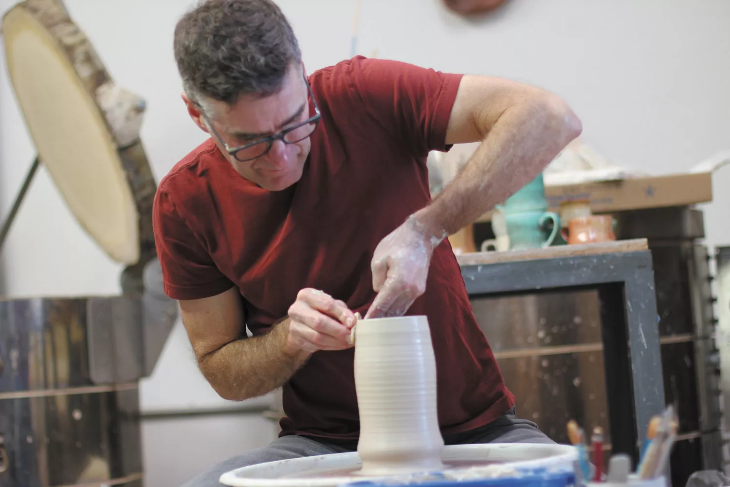 Chris Kelsey creates functional and sculptural artworks out of clay at Spokane's Trackside Studio