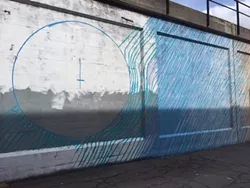 A colorful addition to a once-bedraggled alley behind Barrister Winery