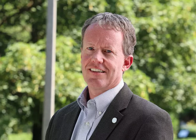 A new transit line and freeway are heading to Spokane Community College, but Kevin Brockbank prefers to walk around campus (2)