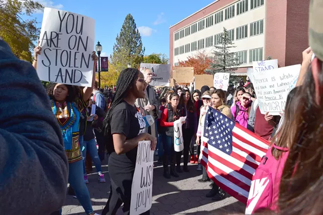 'Trump Wall' at WSU is met by scores of protesters