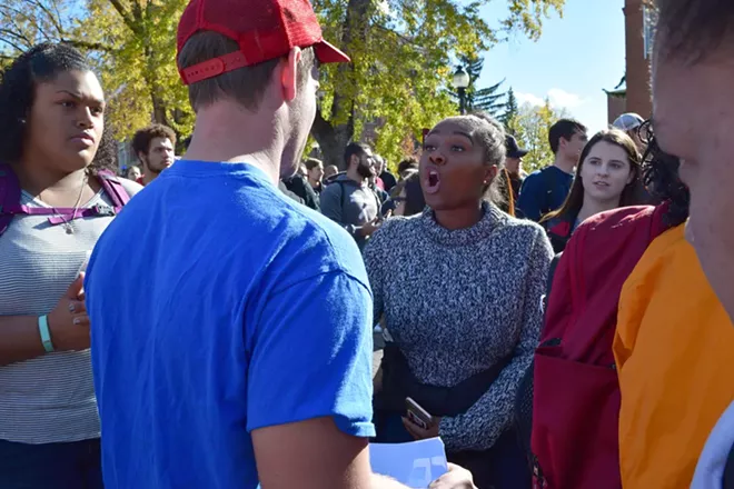 'Trump Wall' at WSU is met by scores of protesters