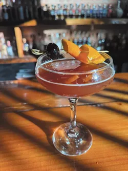 Whet your whistle with one of a thousand whiskeys at Purgatory Whiskey Bar