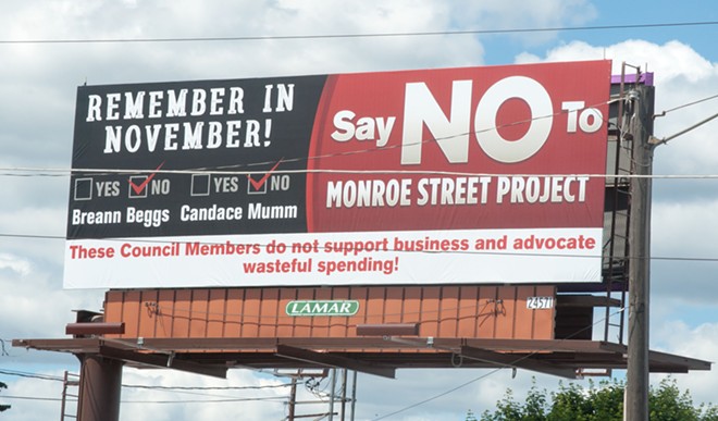 Councilmembers Beggs and Mumm never voted on Monroe  lane reduction — but billboard targets them anyway