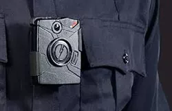 A Big Test of Police Body Cameras Defies Expectations