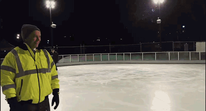 Mayor David Condon and others test out Riverfront Park's new ice-skating ribbon
