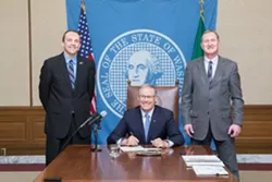 Despite opposition from current members, Inslee signs bill to expand Spokane County Commission