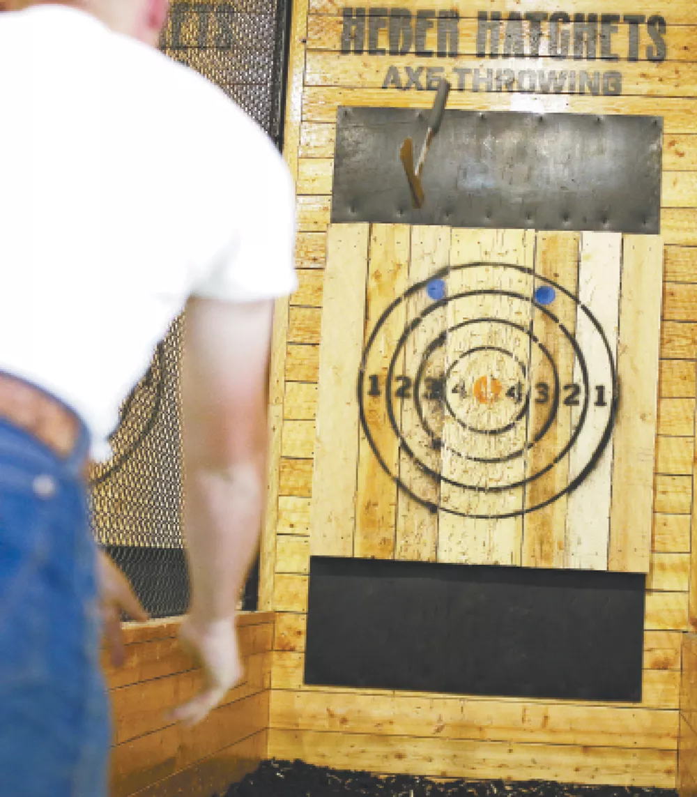 New axethrowing venues aim to be a big hit among the curious and