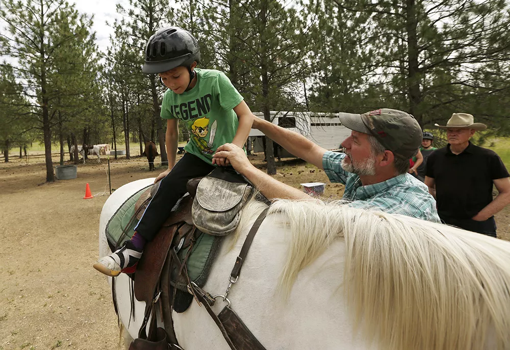 Horseback trail rides offered through Riverside State Park to riders of