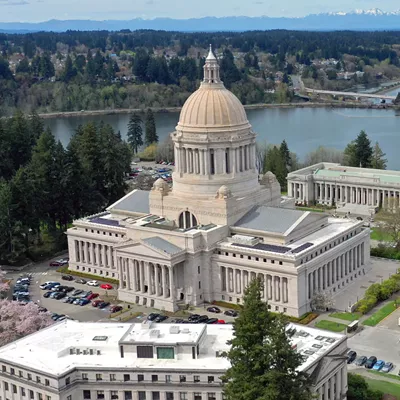 State budget proposals would boost state worker raises, care providers, special ed