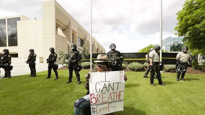 Image: VIDEO: Woman says she 'couldn't breathe' when Spokane police pressed a knee on her neck in cloud of tear gas